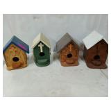 Four beautiful, handmade, plywood birdhouses, with