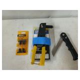 Riveter, mini levels in package, and a folding saw