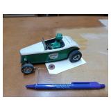 Sinclair roadster with Dino driver, coin Bank