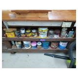 Contents of two shelves in workbench, includes
