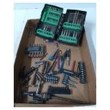 Assorted drill bits and nuts