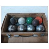 Set of boules / bocce balls in wooden case, needs