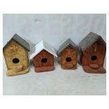 Four cute handmade, plywood birdhouses, with