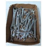 Various wrenches of different sizes and brands