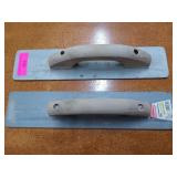 Pair of concrete floats, one is a Goldblatt cast