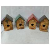 Set of four handmade plywood birdhouses, with