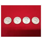 Four 1967 Kennedy half dollars