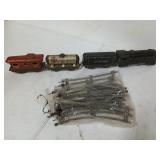 Antique metal train cars and track, USA