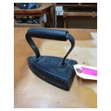 Number five sad iron