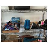 Shelf contents including puppy dog items,