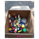 Box full of cleaning supplies, and some sewing