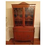 Lovely wooden china cabinet with glass doors,