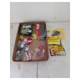 Assorted fishing lures, most are new in package,