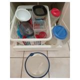 Plastic laundry basket of assorted plastic