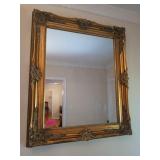 Beautiful ornately framed mirror 38 x 31
