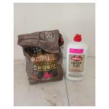 2/3 full lighter fluid and half a bag of