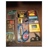 Assorted nails, staples, pegs, and more