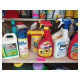Shelf of assorted bug killers, weed killers,