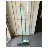 Two push brooms