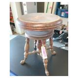 Wooden swivel piano stool with cast iron fish