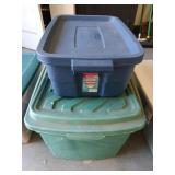Two plastic storage containers, one is empty,