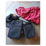 Two American tourister suitcases, one Christmas