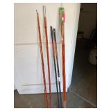 Bamboo fishing poles and a Shakespeare Durango