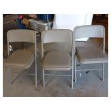 Three folding chairs, could use a good cleaning