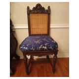 Pair of carved oak cane bottom and back dining