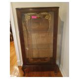 Walnut whatnot cabinet with glass door and shelves