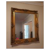 Beautiful ornately framed mirror 38 x 31