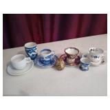 Asst teacups and saucers, decor