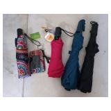 Four umbrellas, two are new, one is Vera Bradley
