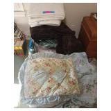 Pile of blankets / bedding, and vacuum seal bags
