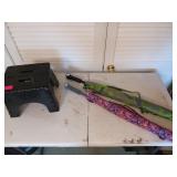 Two brand new large umbrellas and a small black