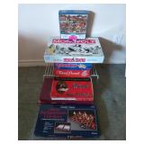Assorted games and puzzles, and one wire rack,