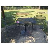 Wrought iron patio table and two chairs 28 x 30 x