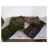 Two pairs of hunting pants. Green Rattlers brand