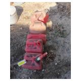 Five small gas cans