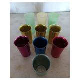 Three Tupperware cups, and seven aluminum