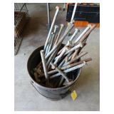 5 gallon metal bucket filled with assorted bolts