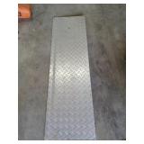 Piece of diamond plate, probably for tailgate,