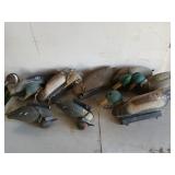 Eight plastic duck decoys with lead weights,
