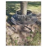 Cast aluminum around the tree sitting bench few