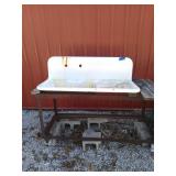 Old school porcelain sink 42x48x20 on heavy m
