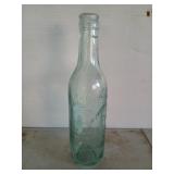 B.J.E Mullins 9 oz glass bottle