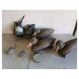 Five plastic duck decoys, two are duck butts,