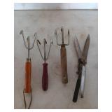 Four handheld gardening tools