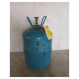 Full or close to full, bottle of R-414B hot shot