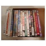 16 assorted DVDs, some are new in package